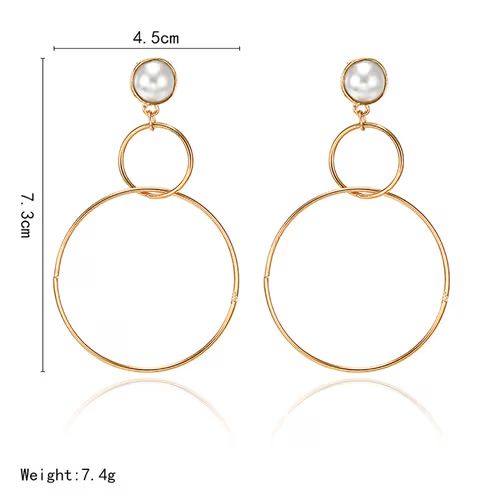 Bold circular statement earrings
